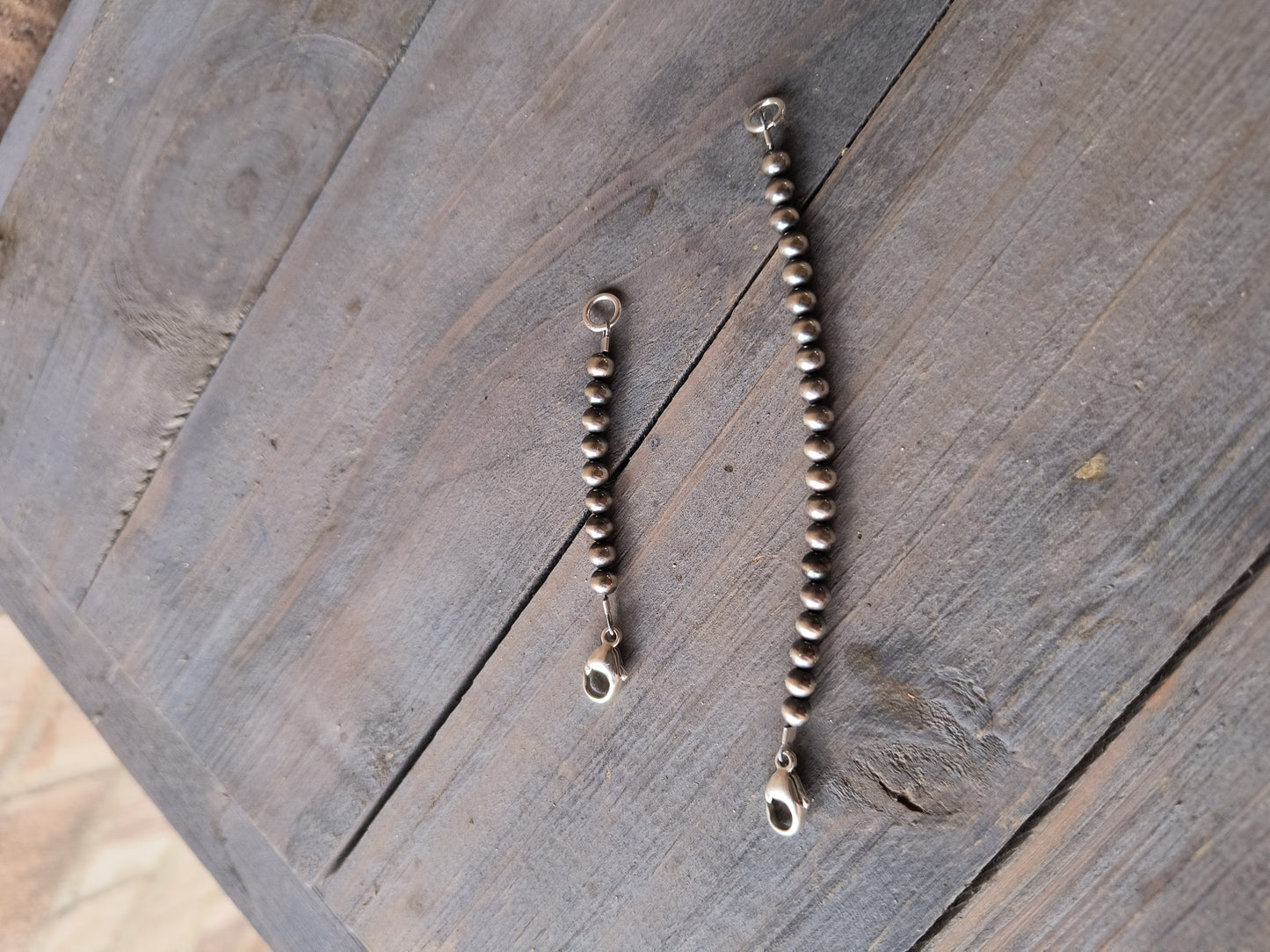 Necklace extenders